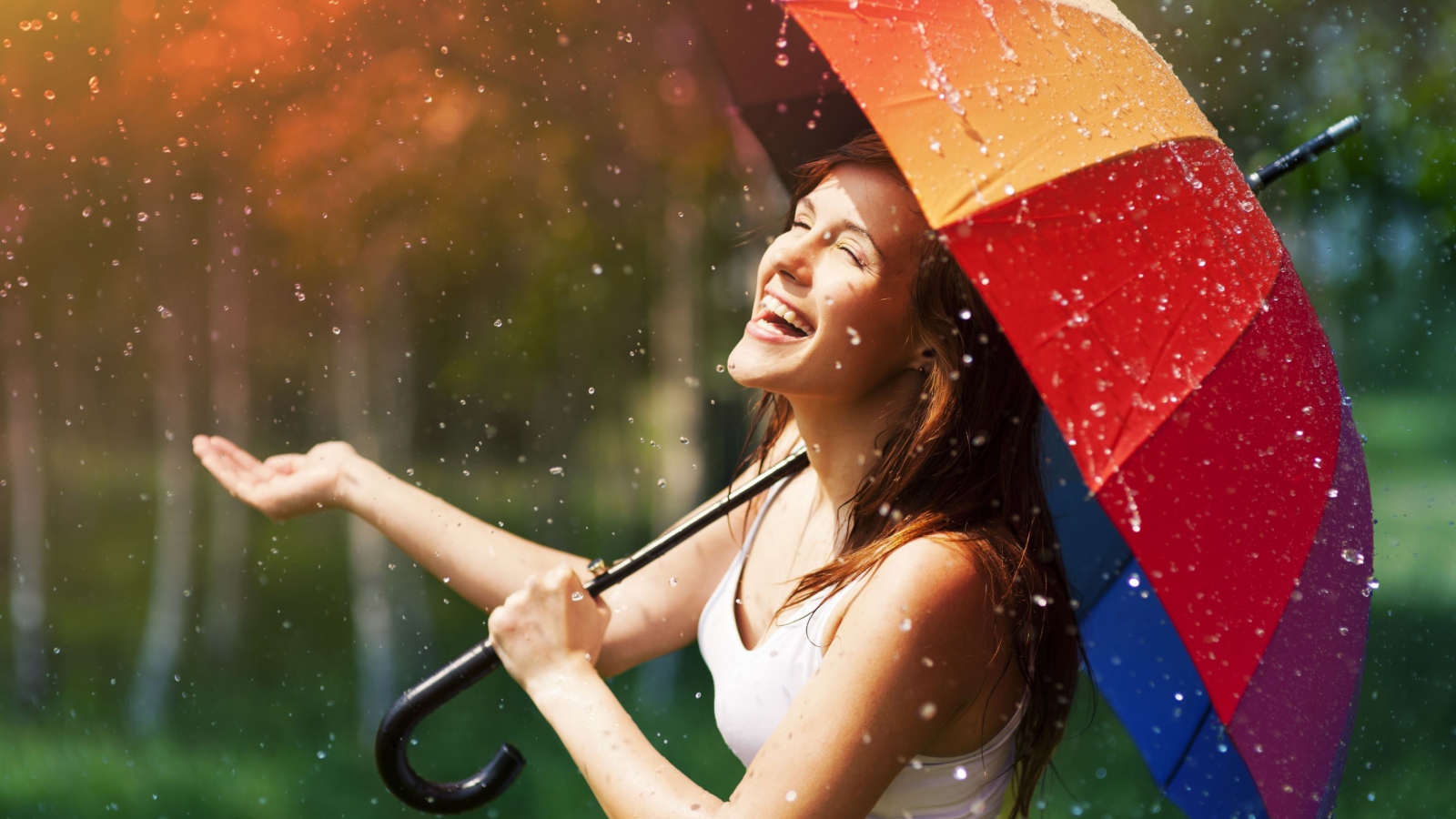 Happy Girl With Rainbow Umbrella Under Summer Rain screenshot #1 1600x900