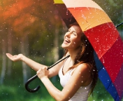 Happy Girl With Rainbow Umbrella Under Summer Rain screenshot #1 176x144