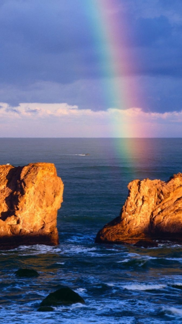 Das Ocean, Rocks And Rainbow Wallpaper 750x1334