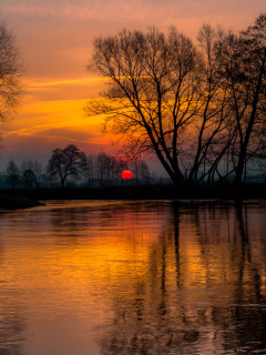 Das Atmospheric optic Reflection and Sunset Wallpaper 240x320