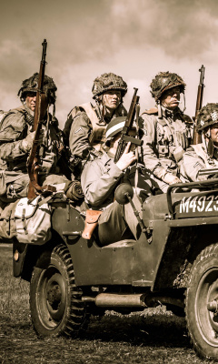 Soldiers on Jeep wallpaper 240x400