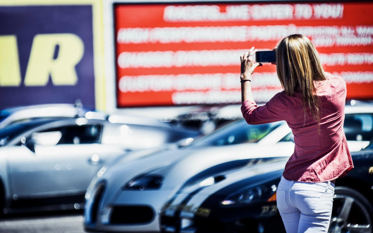Girl Taking Photo With Her Phone wallpaper 1280x800