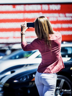 Girl Taking Photo With Her Phone screenshot #1 240x320