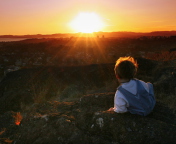 Sfondi Little Boy Looking At Sunset From Hill 176x144