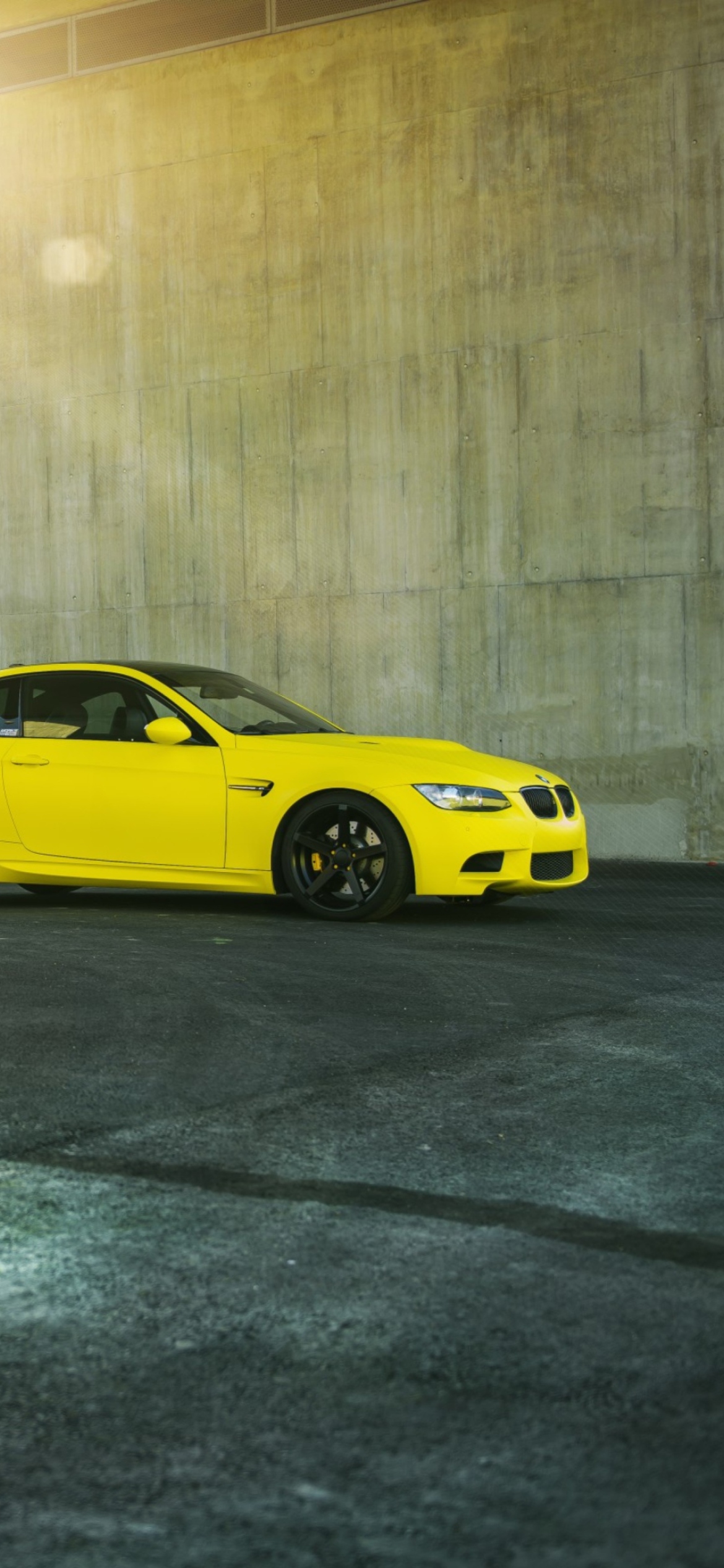 Yellow BMW wallpaper 1170x2532