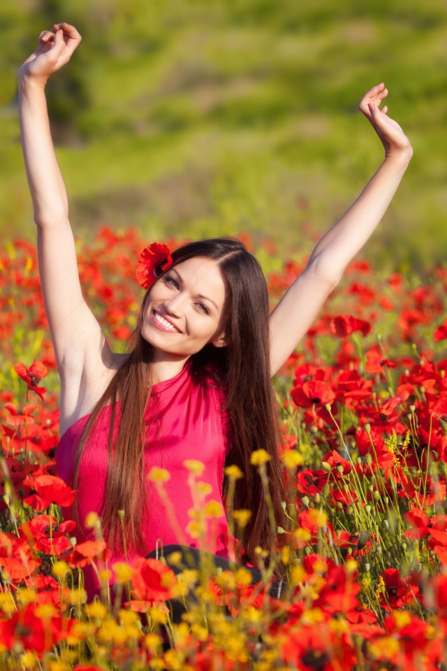 Happy Girl In Flower Field wallpaper 640x960