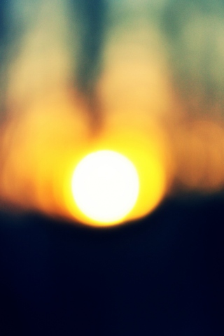 Fondo de pantalla Blurred Sunset 320x480