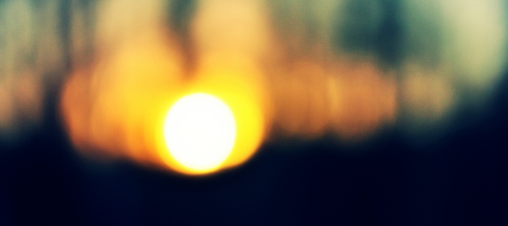 Sfondi Blurred Sunset 720x320