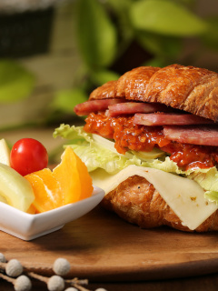 Croissant with ham wallpaper 240x320