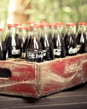 Fondo de pantalla Vintage Coca-Cola Bottles 176x220