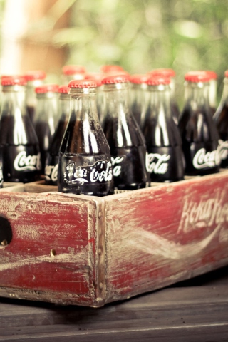 Das Vintage Coca-Cola Bottles Wallpaper 320x480