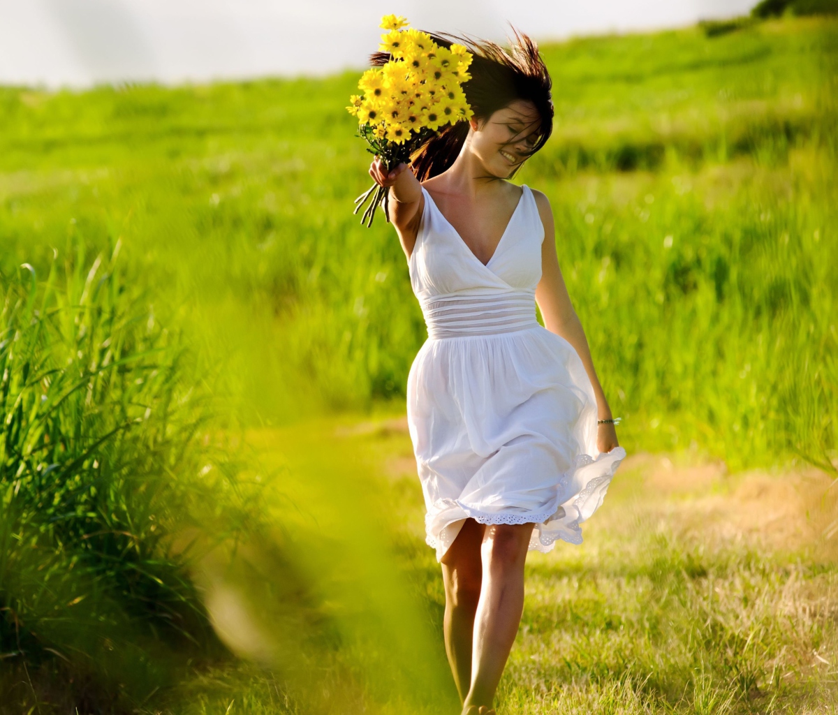 Sfondi Girl With Yellow Flowers In Field 1200x1024