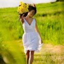 Das Girl With Yellow Flowers In Field Wallpaper 128x128