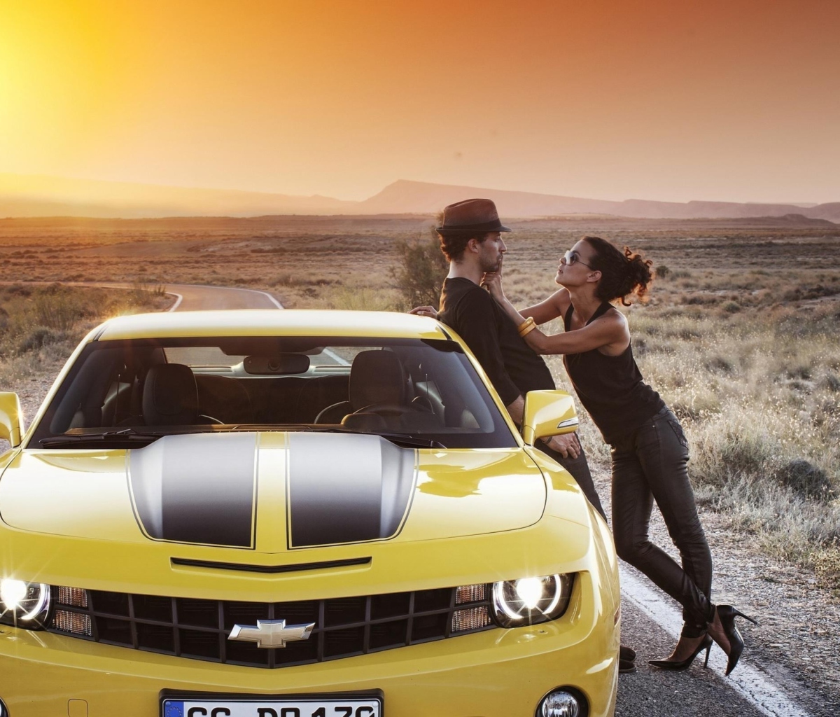 Couple And Yellow Chevrolet wallpaper 1200x1024