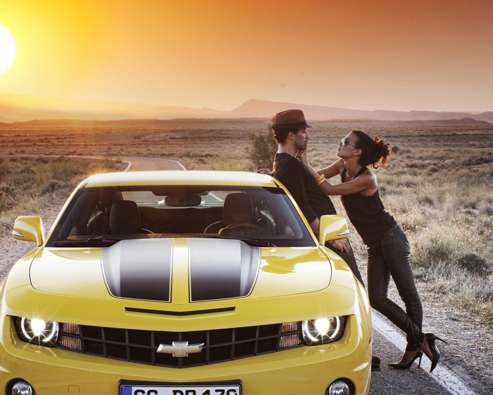Couple And Yellow Chevrolet wallpaper 1600x1280