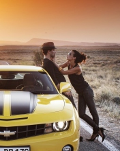 Couple And Yellow Chevrolet wallpaper 176x220