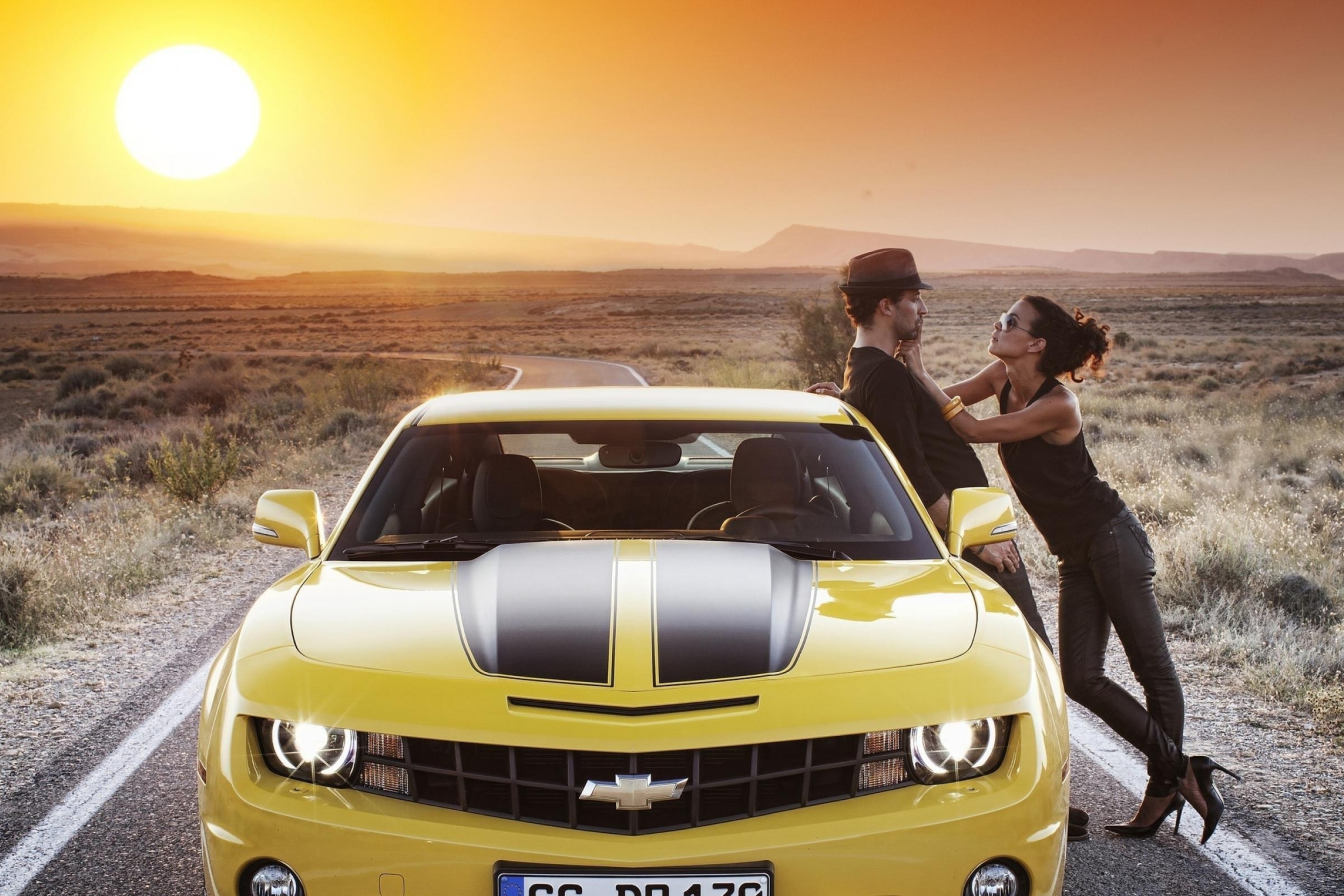 Couple And Yellow Chevrolet wallpaper 2880x1920