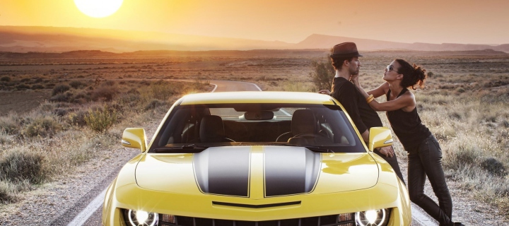 Couple And Yellow Chevrolet wallpaper 720x320