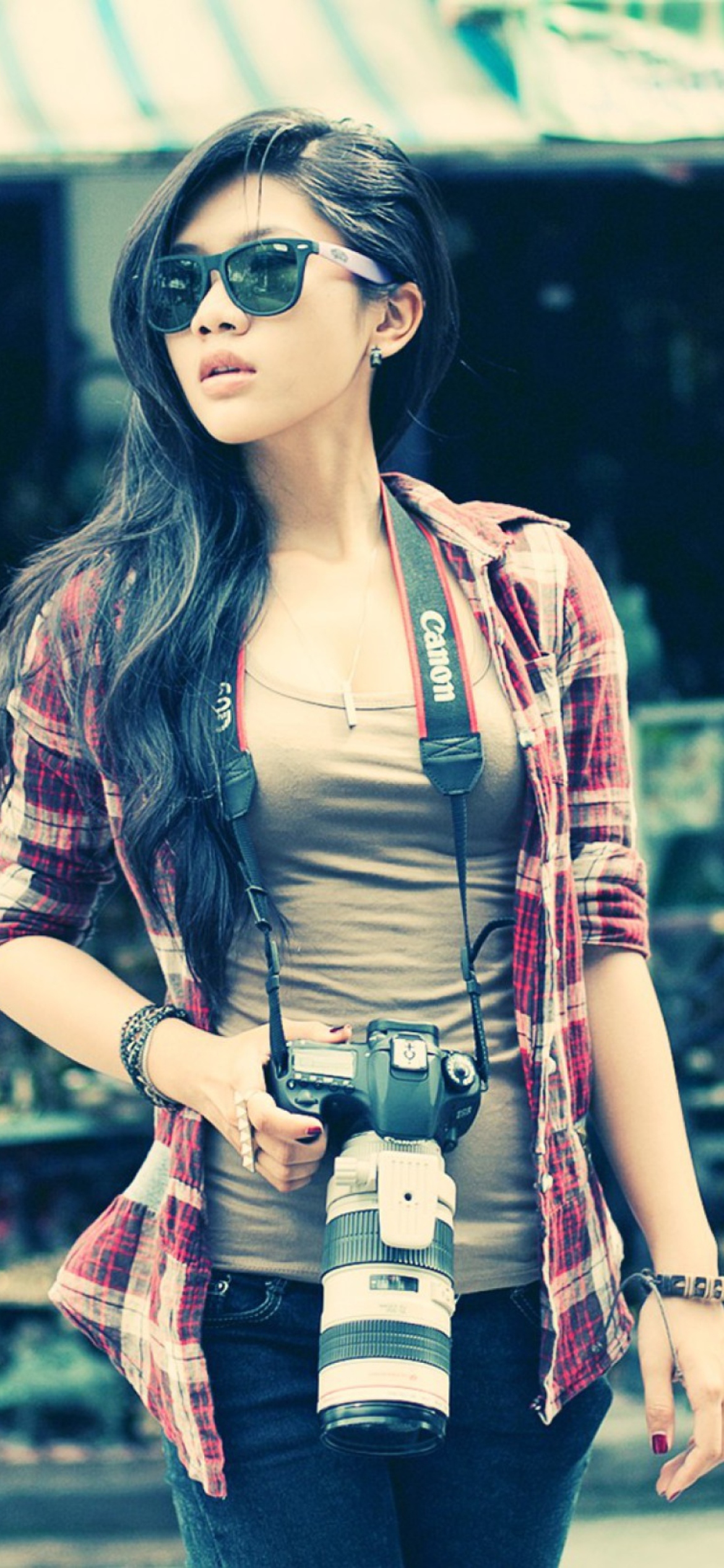 Brunette Asian Girl With Photo Camera wallpaper 1170x2532