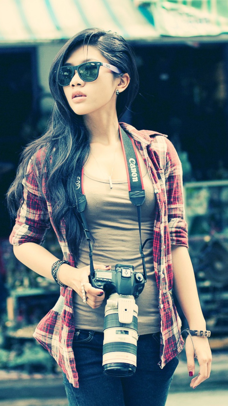 Brunette Asian Girl With Photo Camera wallpaper 750x1334