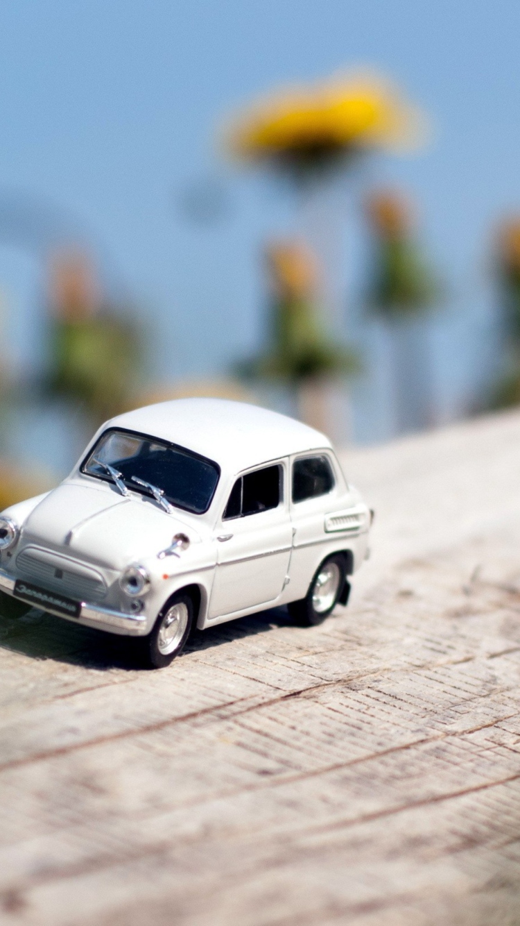 Fondo de pantalla Miniature Toy Car 750x1334