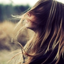 Sfondi Beautiful Girl With Wind In Her Hair 128x128