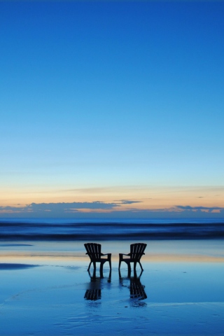 Sfondi Beach Chairs For Couple At Sunset 320x480