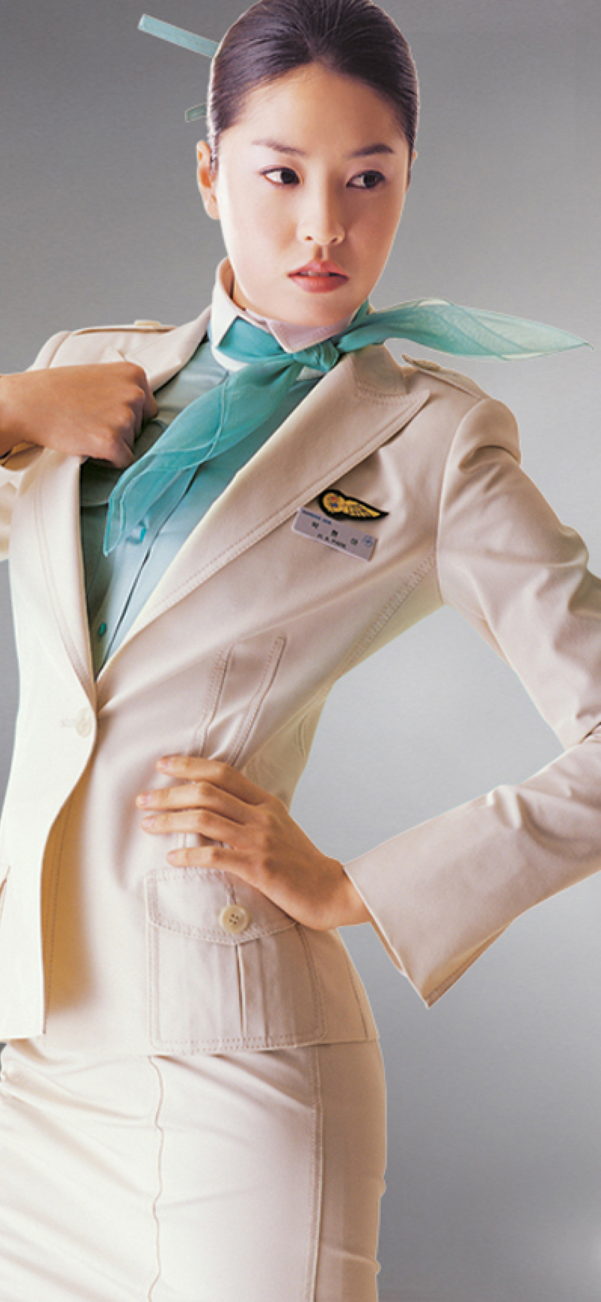 Korean Air Flight Attendant Uniform wallpaper 1170x2532