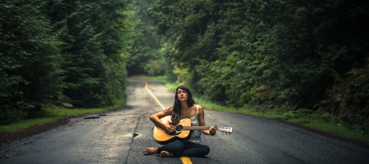 Girl Playing Guitar On Countryside Road wallpaper 720x320