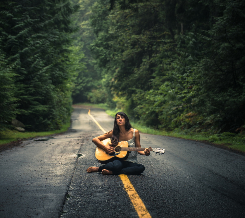 Girl Playing Guitar On Countryside Road wallpaper 960x854