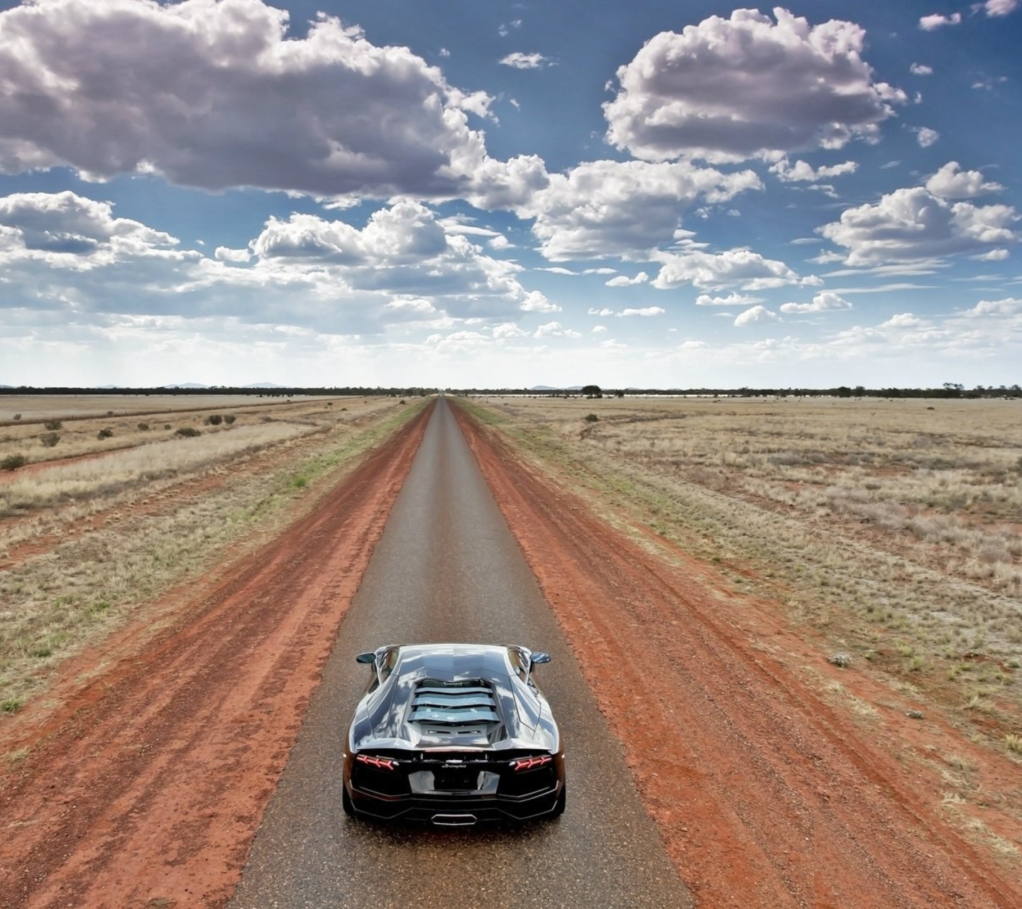 Lamborghini Aventador On Empty Country Road wallpaper 1440x1280