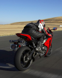 Fondo de pantalla Riding Red Bike 128x160