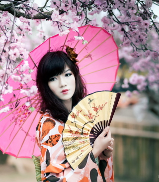 Kostenloses Japanese Girl Under Sakura Tree Wallpaper für Nokia Asha 306