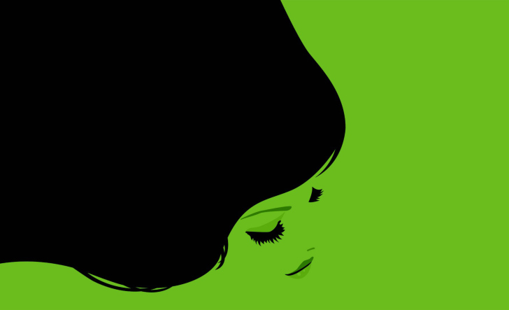 Das Girl's Face On Green Background Wallpaper