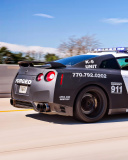 Обои Police Nissan GT-R 128x160