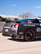 Sfondi Police Nissan GT-R 132x176