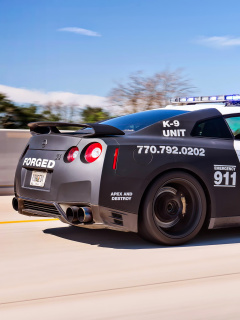 Обои Police Nissan GT-R 240x320