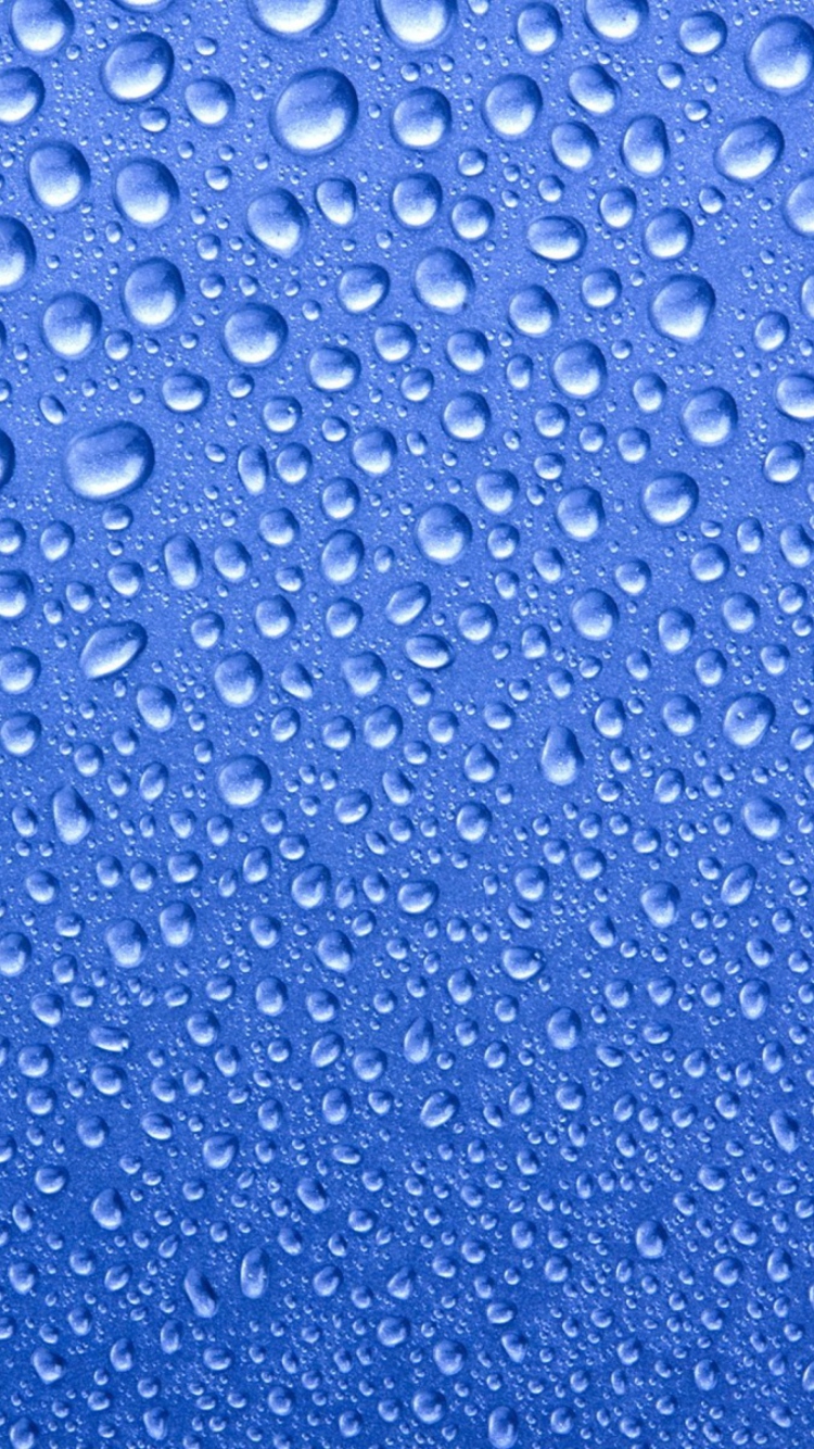 Water Drops On Blue Glass wallpaper 750x1334