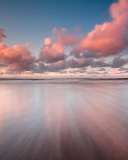 Beautiful Pink Clouds Over Sea wallpaper 128x160