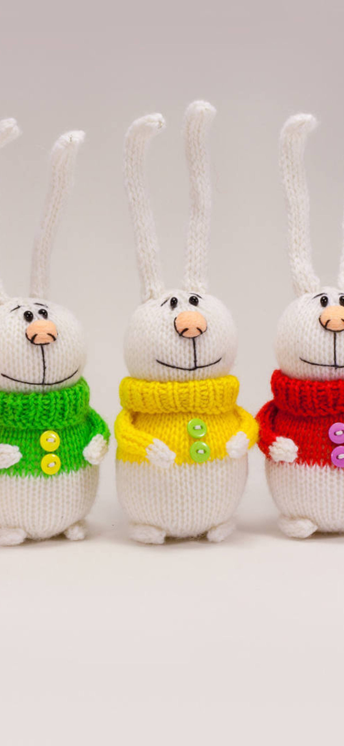 Funny Knitted Bunnies wallpaper 1170x2532