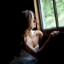 Girl Looking At Window wallpaper 128x128