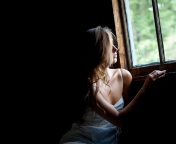 Girl Looking At Window wallpaper 176x144