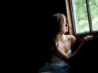 Girl Looking At Window wallpaper 320x240