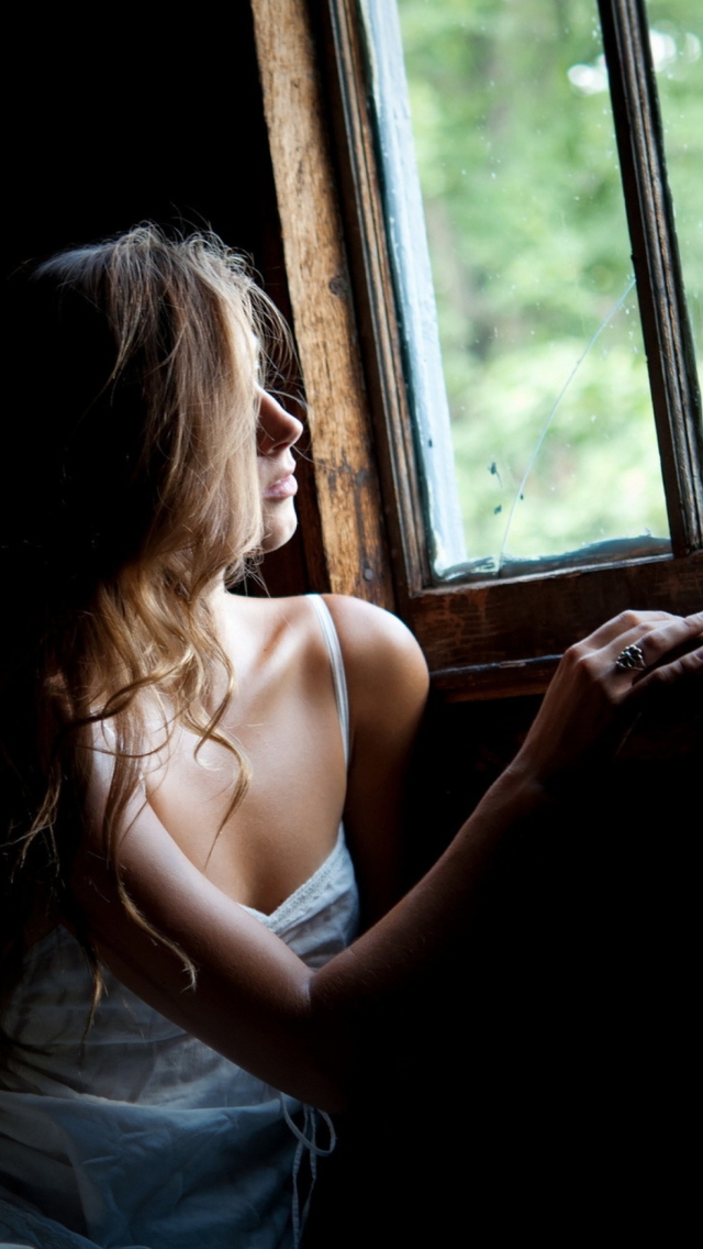 Girl Looking At Window wallpaper 640x1136
