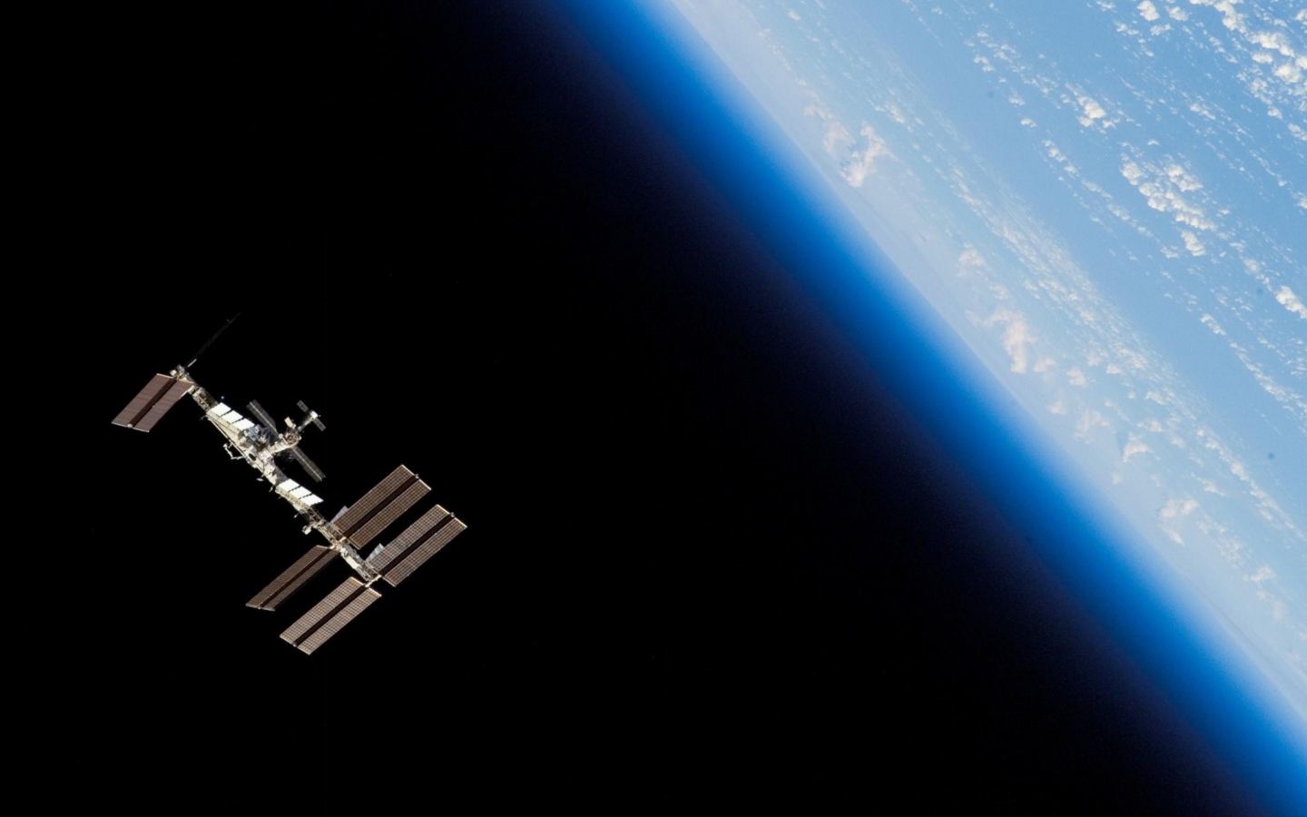 The ISS In Space wallpaper 1440x900