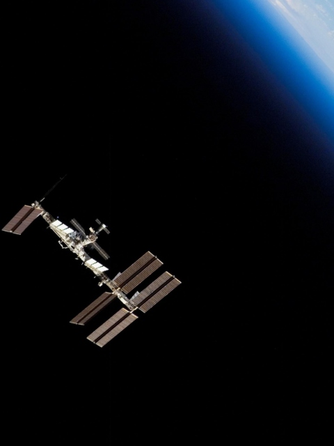 The ISS In Space wallpaper 480x640