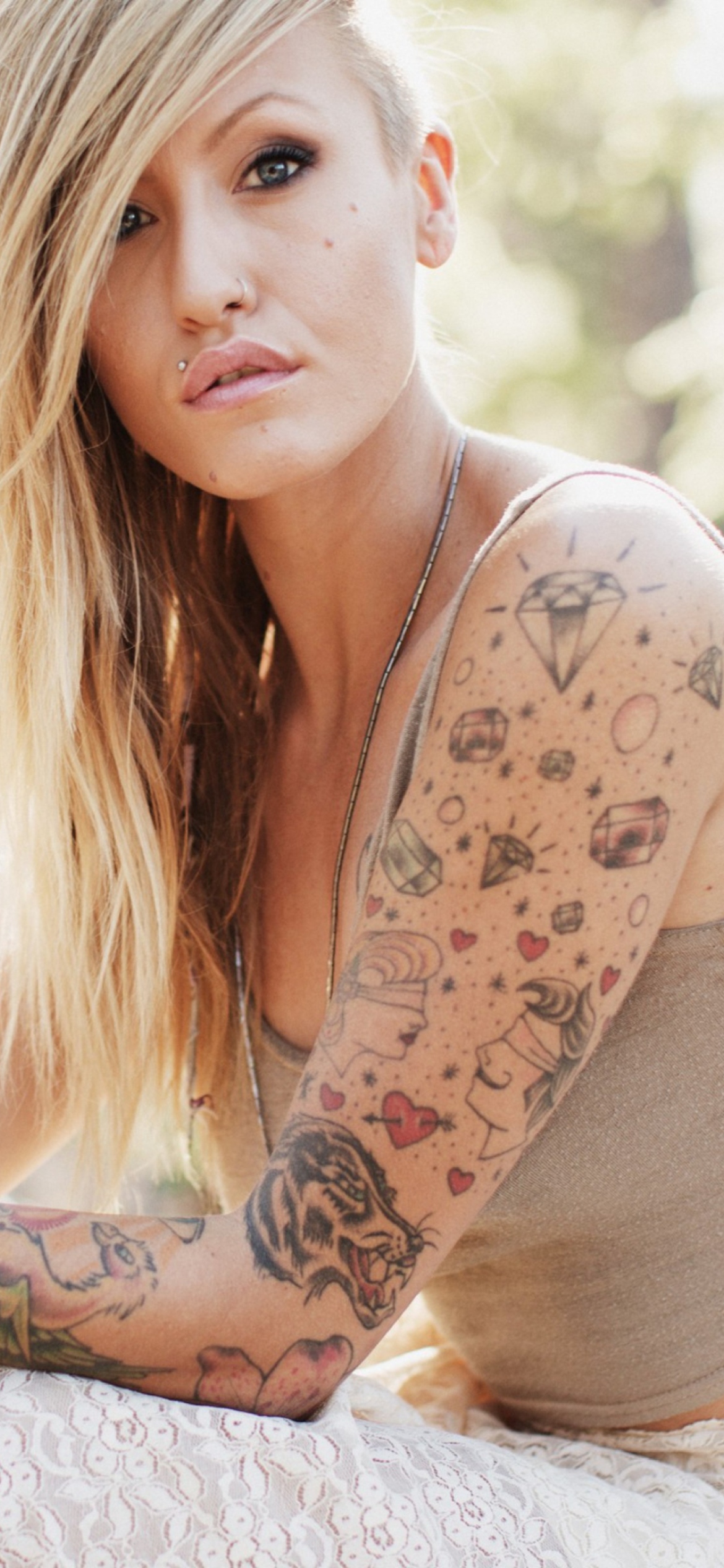 Blonde Model With Tattoes wallpaper 1170x2532
