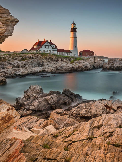 Lighthouse On Rocky Seashore screenshot #1 480x640