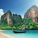 Boat And Rocks In Thailand wallpaper 128x128