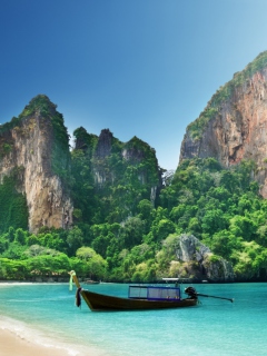 Boat And Rocks In Thailand wallpaper 240x320